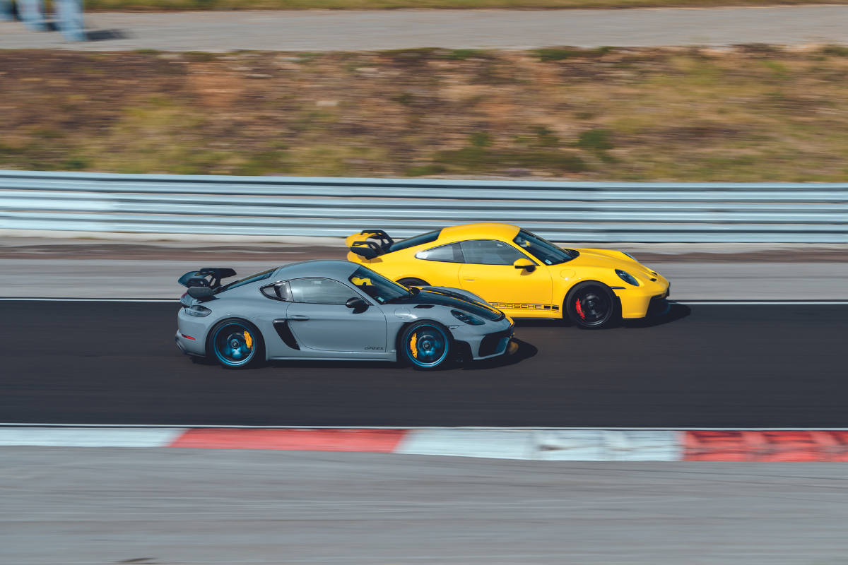 Porsche 992 gt3 vs porsche cayman gt4 rs flat 6 magazine