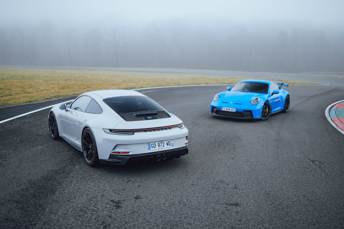 Porsche gt3 vs gt3 touring flat 6 magazine png